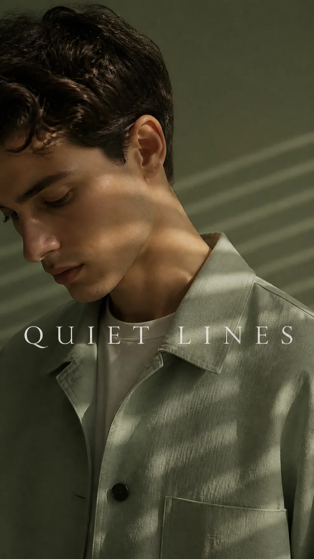 Premium minimalist campaign. Main Subject: Young male model wearing a soft sage-green overshirt. Creative Dir… - AI提示词参考图，来自西西提示词