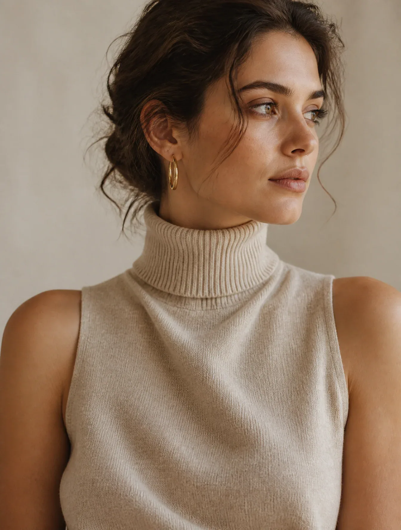 A single polished gold hoop earring catches a soft highlight on her left ear. She wears an elegant sleeveless… - AI prompt reference from CC Prompt Galaxy
