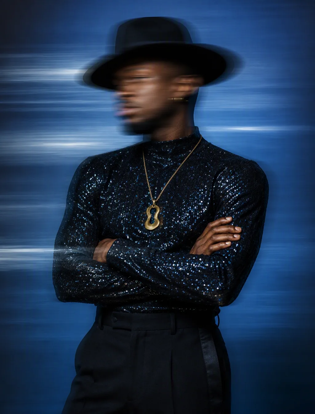 A medium shot captures a Black male model from the waist up, posing with his arms crossed. He wears a black, … - AI prompt reference from CC Prompt Galaxy