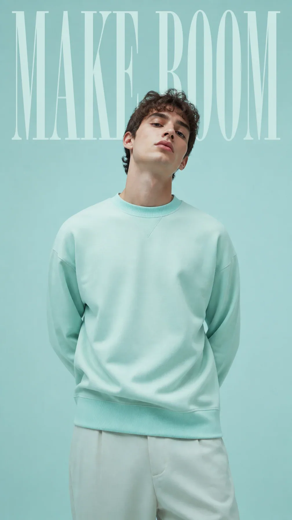 Premium editorial campaign. Main Subject: Young male model wearing a bright ice-mint sweatshirt. Pose: Slight… - AI提示词参考图，来自西西提示词