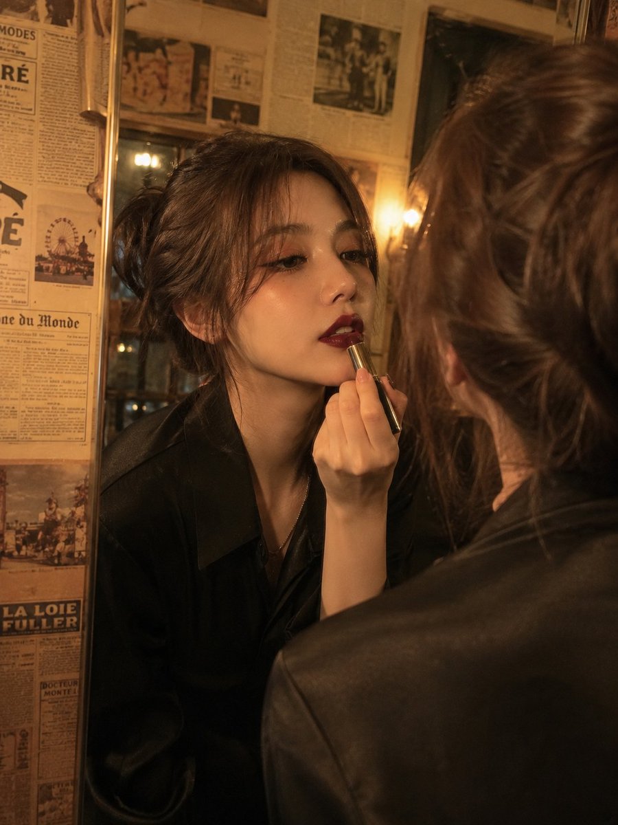 Cinematic vintage beauty portrait of an elegant young woman applying {argument name="lipstick color" default=… - AI提示词参考图，来自西西提示词