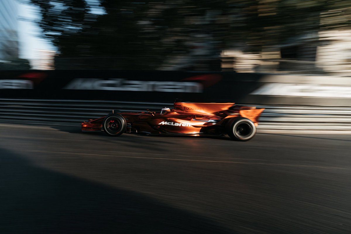Create a cinematic motorsport panning photograph of a single {argument name="race car team" default="McLaren"… - AI prompt reference from CC Prompt Galaxy
