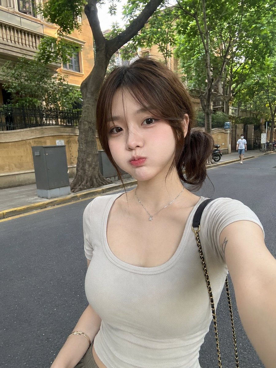 A RAW, ultra-realistic smartphone photo of {argument name="subject" default="a beautiful young East Asian wom… - AI提示词参考图，来自西西提示词