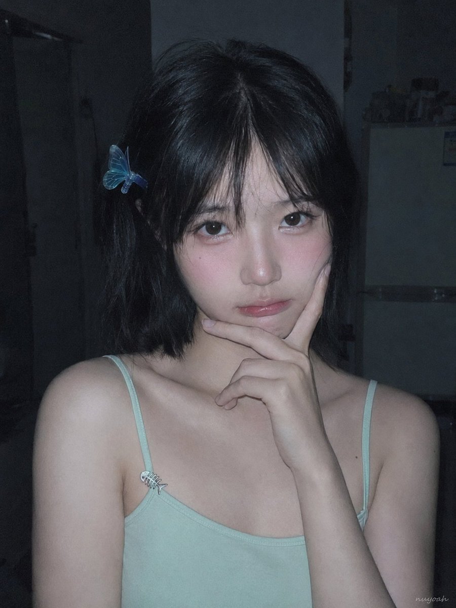 Create a realistic late-night candid portrait photo of {argument name="character name" default="a young East … - AI提示词参考图，来自西西提示词