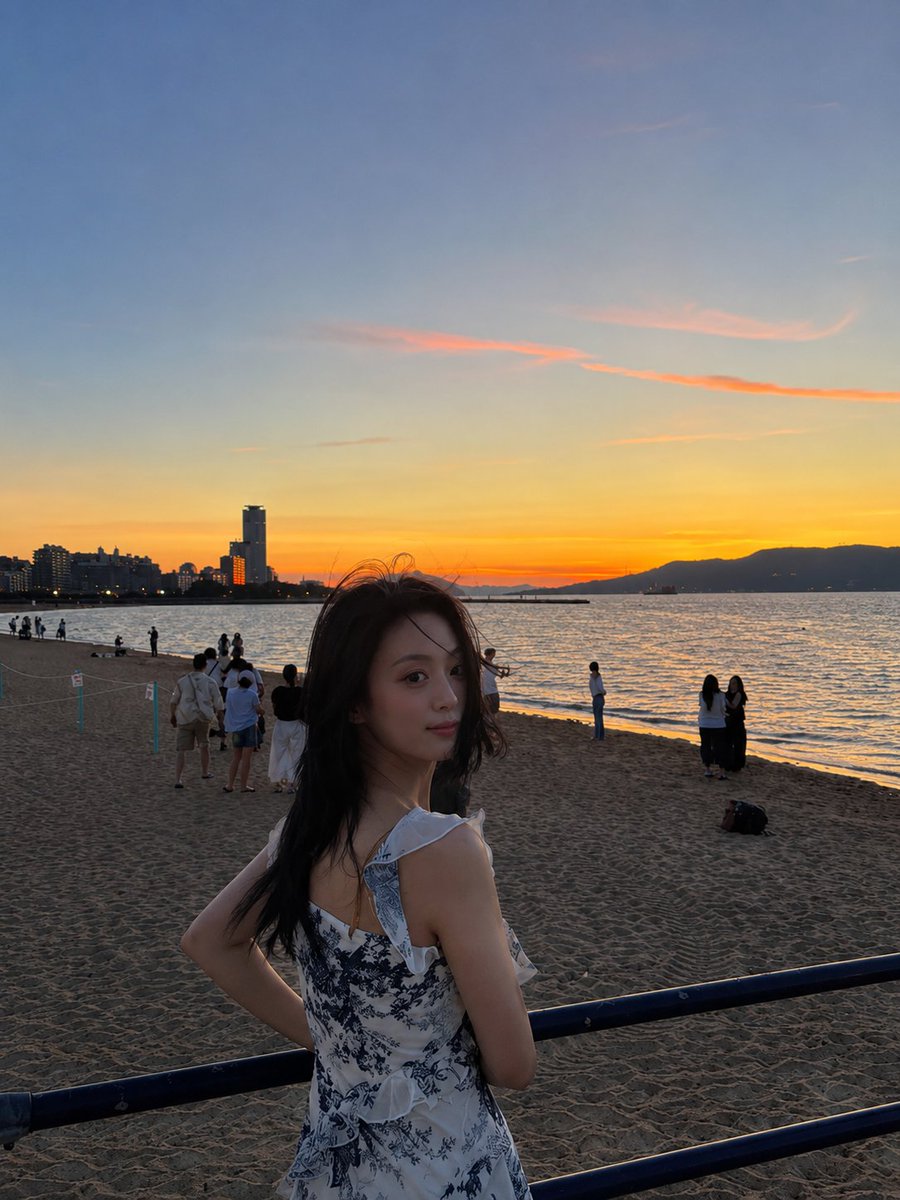 Ultra-realistic cinematic travel photograph of a {argument name="subject" default="young East Asian woman"} s… - AI提示词参考图，来自西西提示词