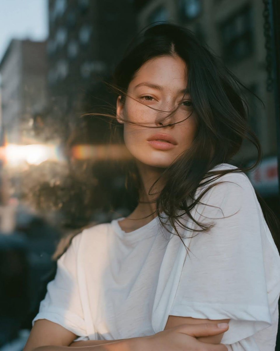 Ultra-realistic cinematic portrait of a {argument name="age" default="young woman in her early 20s"}, natural… - AI提示词参考图，来自西西提示词